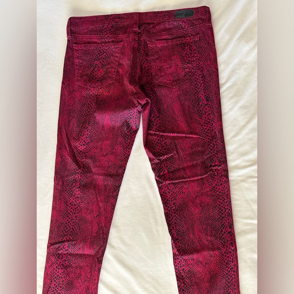 AG stretch mid rise red/black snake skin pattern jean